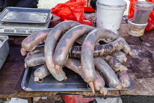 Kazy horse meat sausage lies on the table for sale