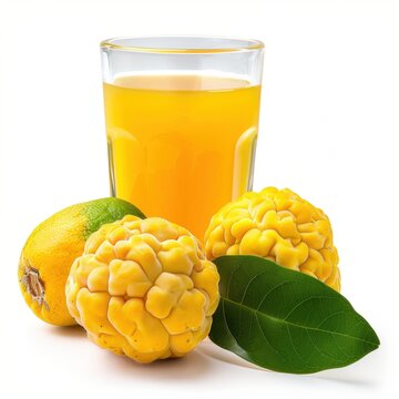 Medium shot of Ugli fruit juice in a glass near the Ugli fruit, isolated on a white background 