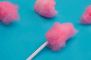 A of pinks and blues with wool and cotton. Cloud heart love concept. A white with balls of candy in pink and blue. A white with balls of cotton lifestyle and wool.