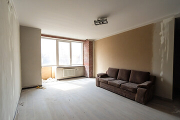 Fototapeta premium apartment at the stage of internal finishing, renovation in the apartment finishing