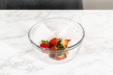 Washed and Dried Strawberries Neatly Stored in a Glass Bowl