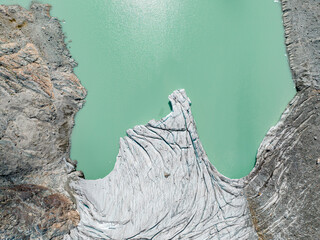 Aerial view of the Fellaria glacier in Valmalenco, Sondrio, Lombardy. Italy. Ice cliff, rock face...