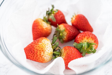 Washed and Dried Strawberries Neatly Stored in a Glass Bowl