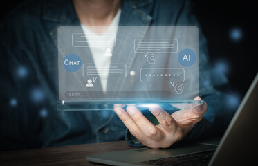 Chat with AI, Artificial Intelligence. Businessman using transparent tablet Discuss some questions and answers with the chatbot for buiness. Futuristic technology transformation.