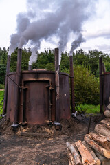 Traditional charcoal burning in retorts in Bieszczady Mountains in Poland