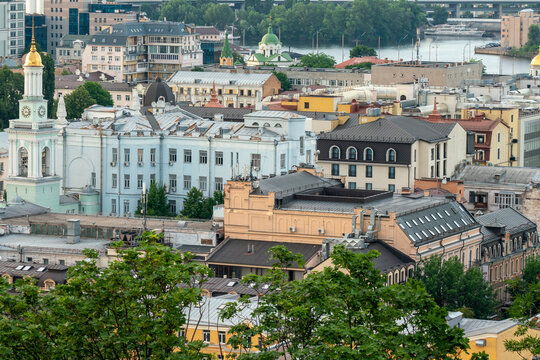 Kontraktova square view from above. Roofs and various colorful buildings of the Podil district - medieval historical downtown district of Kyiv, Ukraine.