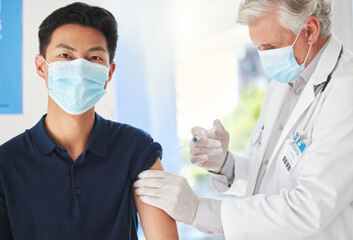 Fototapeta premium Face mask, doctor and portrait of man with injection in clinic for healthcare, protection and virus safety. Medical, ppe and people with syringe in consultation for mpox vaccine, immunity and support