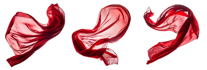 Three transparent red silk scarves float in the wind, the light comes from behind. 