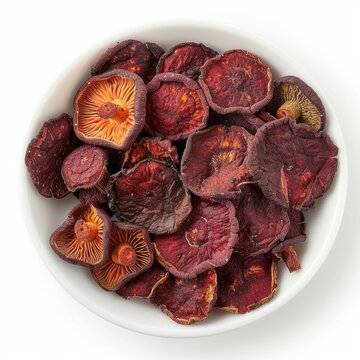 Medium shot of bowl of Dried ganoderma lucidum mushroom, isolated on a white background 
