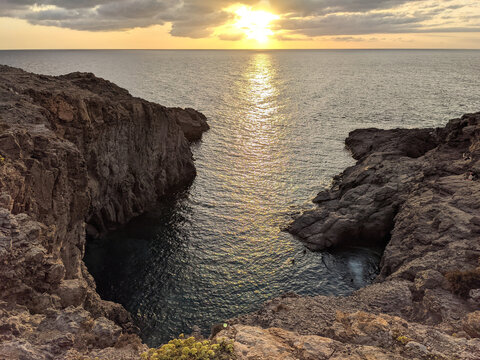 sunset at the coast of Sant'Antioco island near Sardinia, Italy, Europe