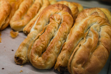 Burek is filo pastry roll filled with cheese, meat, potato, spinach, apple. For breakfast, lunch, dinner, or snack. Burek, also known as bourék, byurek, pita, bourekas, and cheese pie.