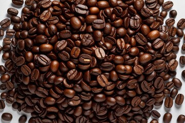 Obraz premium Stunning Panoramic Image of Roasted Brown Coffee Beans on White Background for an Authentic Espresso Experience