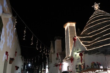Fototapeta premium Christmas illuminations in the old town of in Alberobello, Italy