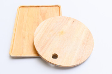 brown wooden tray and sphere cuttingboard isolated on white background