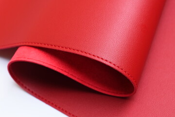 shiny red leather texture isolated on white background