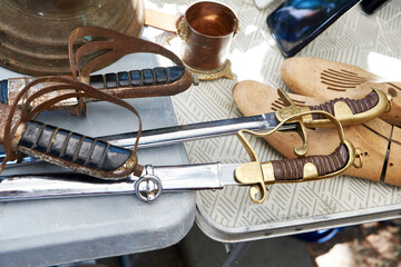 Antique sabers at market