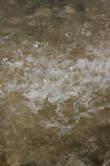 water flowing into the river