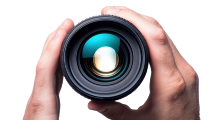 Close-up view of hands holding a camera lens with reflections, isolated on white background, showcasing photography equipment.