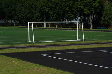 The school stadium. Football goal. The football field is far away