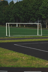 The school stadium. Football goal. The football field is far away