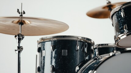 Obraz premium Close-up of an electric drum kit's snare and cymbals, showcasing the modern design against a stark white background