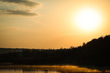 golden sunrise on a summer lake
