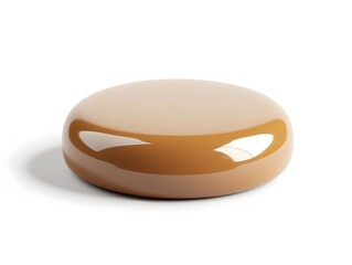 Captivating Confection A Gleaming Golden Brown Circular Delight on a Minimalist White Stage