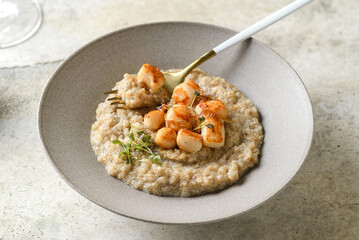 grilled scallops with quinoa and microgreens