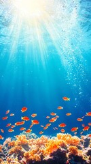 Fototapeta na wymiar Vibrant underwater scene featuring colorful fish swimming above coral with sun rays illuminating the serene blue ocean.