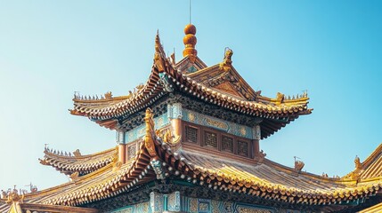 Fototapeta premium Traditional Chinese architecture with pagodas and ornate roofs. No people, clear blue sky.