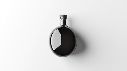 Obraz premium A sleek black bottle with a modern design, ideal for beverages or liquid storage.