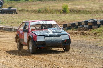 Autocross on a dirt track. rally race. Off-road racing. Training races of racing drivers. Modern modified cars on the road.