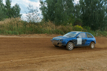 Autocross on a dirt track. rally race. Off-road racing. Training races of racing drivers. Modern...