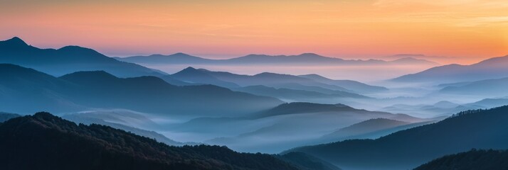 Obraz premium Sunrise Over Misty Mountain Range. Beautiful Landscape Shot Sun Rising Mist Mountains. 