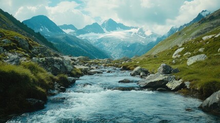 Obraz premium A serene mountain scene with a flowing stream, perfect for text overlay in the sky. No people.