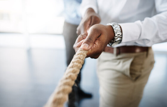 Hands, competition and tug of war in office with rope for business people, game and solidarity for mission. Contest, link and team building for support, trust and challenge for synergy at workplace - Powered by Adobe