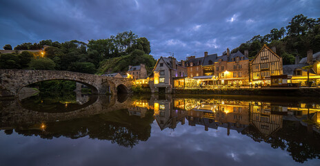 Fototapeta premium Port de Dinan with stone bridge, picturesque town of Dinan, Brittany, along the Rance River.