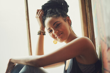 Window, happy and portrait of African woman in home for relaxing, resting and chill on weekend....