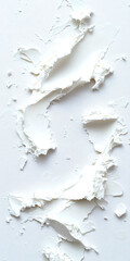 Fototapeta premium Abstract texture of white crumpled material on a light background, perfect for background designs and artistic projects.