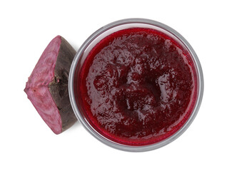 Tasty beetroot smoothie in glass and piece of fresh vegetable isolated on white, top view. Vegan drink