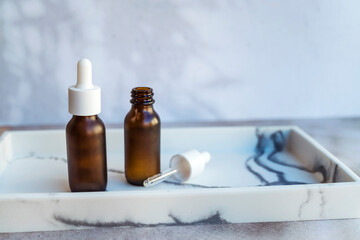 Amber Glass bottle with vitamin C . Vitamin C serum with lemon  fruit