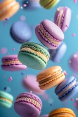 Obraz premium Colorful macarons floating in midair against a vibrant blue background, ideal for celebrations