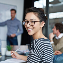 Smile, portrait and businesswoman writing notes in office for meeting at hr training for company...