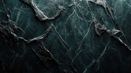 Dark, textured stone background with white veins and cracks.