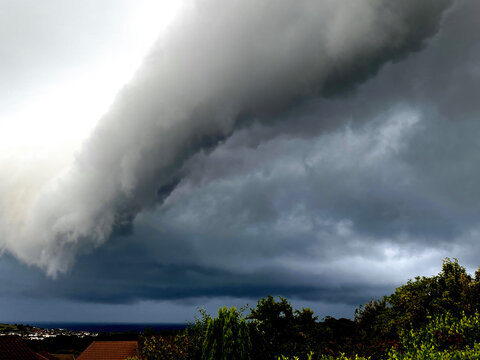 A roll cloud races across the sky preceding a big thunderstorm over Onchan Isle of Man