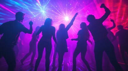 Silhouettes of People Dancing in a Nightclub with Colorful Laser Lights