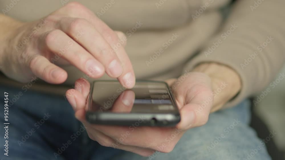 Aufkleber CloseUp of Hands Using Smartphone for Browsing and Communication. Person interacts with a mobile device, touching the screen, texting, and scrolling. Modern technology and connectivity