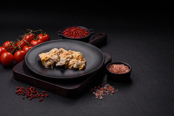 Delicious boiled beef or pork tongue sliced with carrots, onions, sour cream