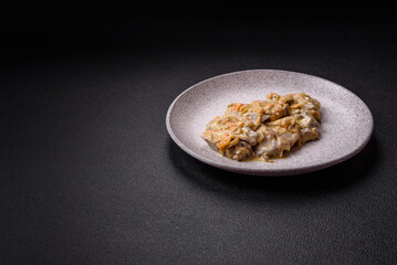 Delicious boiled beef or pork tongue sliced with carrots, onions, sour cream