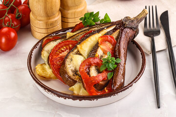 Baked tomato with mozzarella and tomato